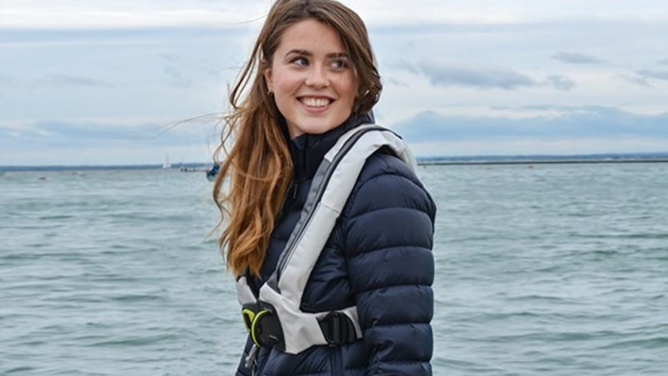 A woman wearing a Spinlock PFD